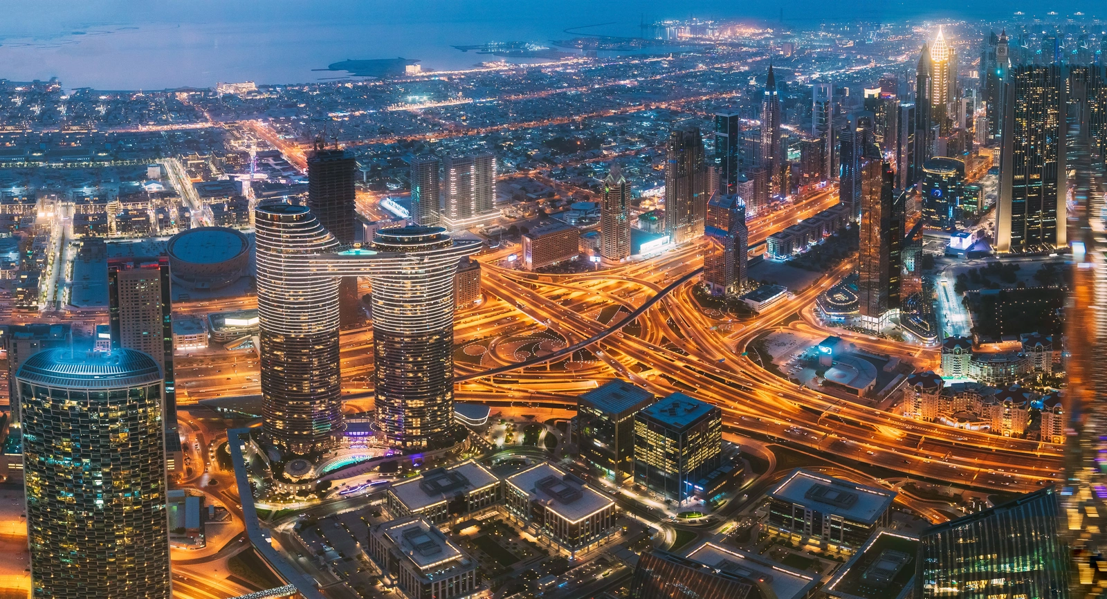 Aerial night view of Dubai skyscrapers — 60-minute Fawri business setup platform
