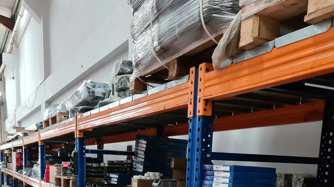 Shelves of car spare parts and accessories in an auto parts warehouse