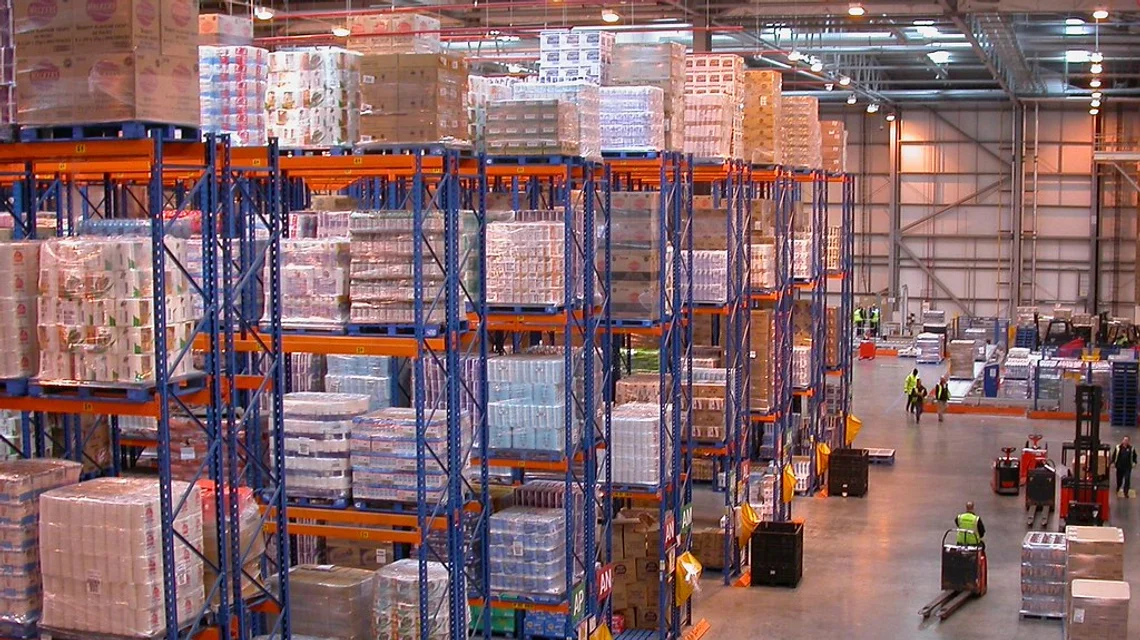 Interior of a cold storage warehouse with frozen goods on racking