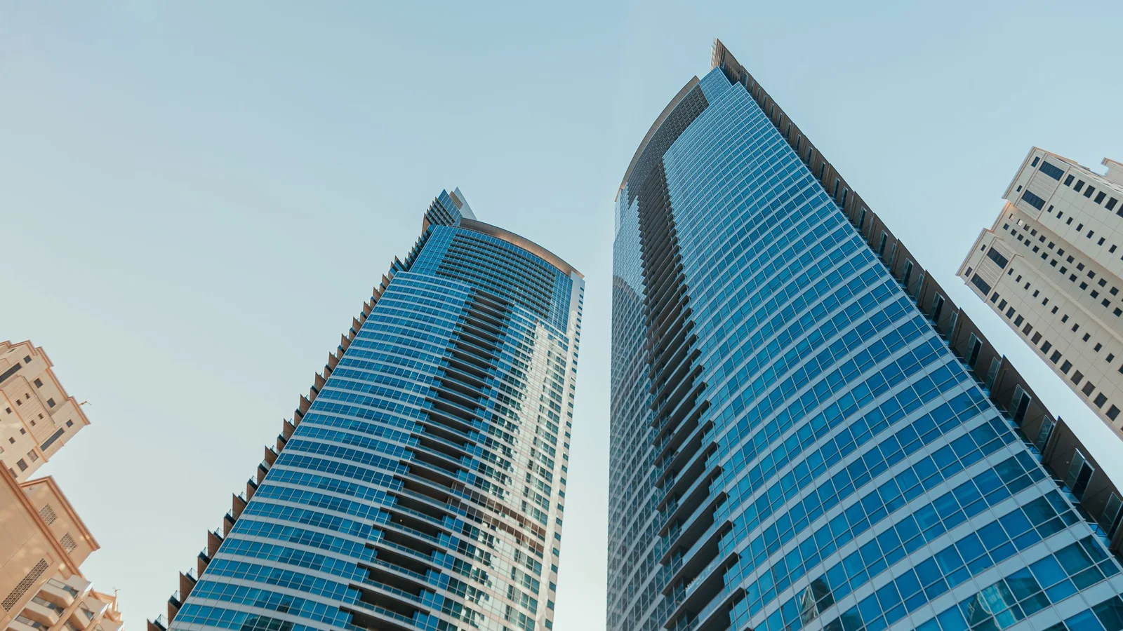 Dubai Commercial Lease Guide 2026: The Tenancy Law Does Cover Your Shop, Office and Warehouse, But the Rental Index, the Service Charge Regime and the Chiller Bill Are Not What Residential Guides Tell You — Dubai business setup