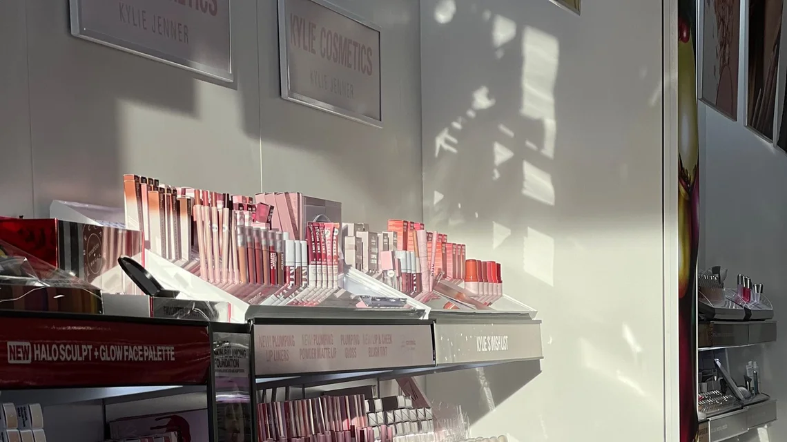 Shelves of cosmetics and skincare products in a beauty store
