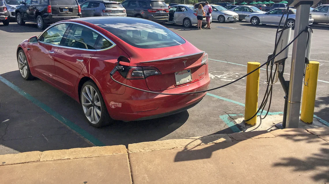 Electric vehicle charging at a public charging station