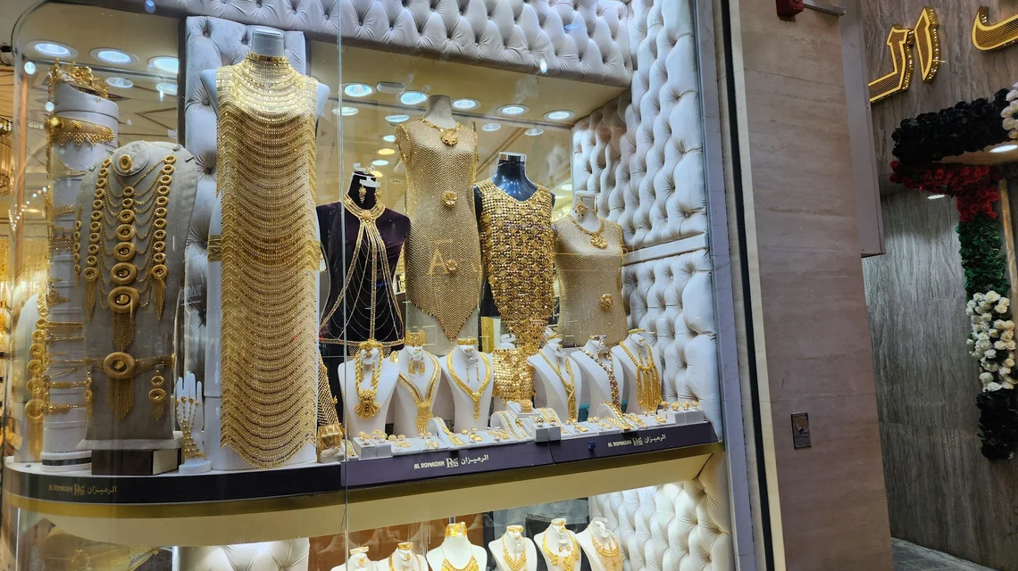 Gold jewellery display in a Dubai Gold Souk shop window