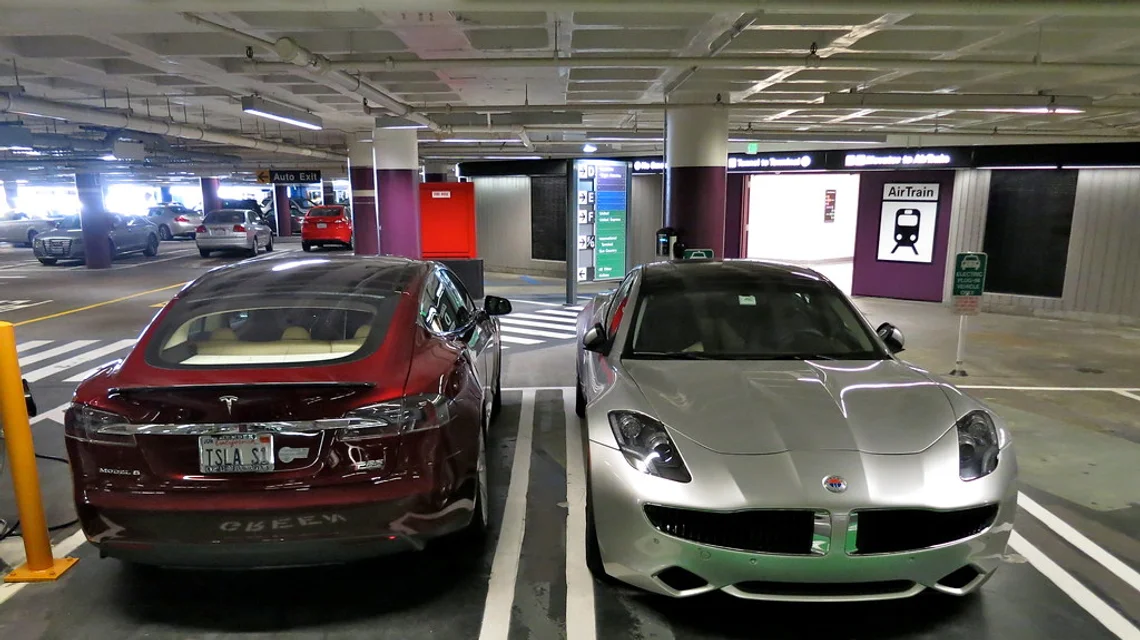 Luxury electric vehicles parked in a fleet bay
