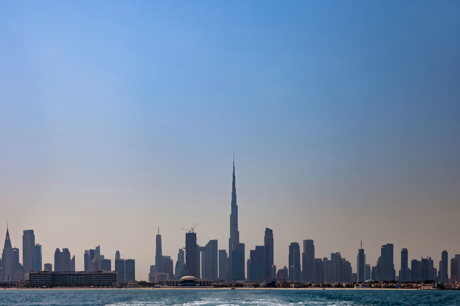 Panoramic silhouette of Dubai skyscrapers — 2026 UAE visa changes for entrepreneurs