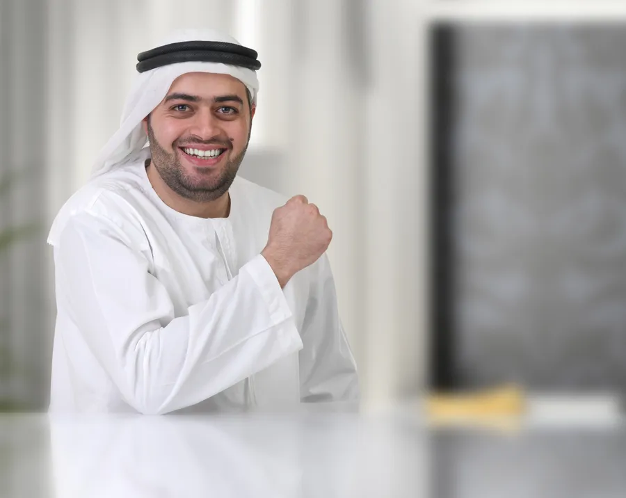 An Emirati business advisor at work in a Dubai office